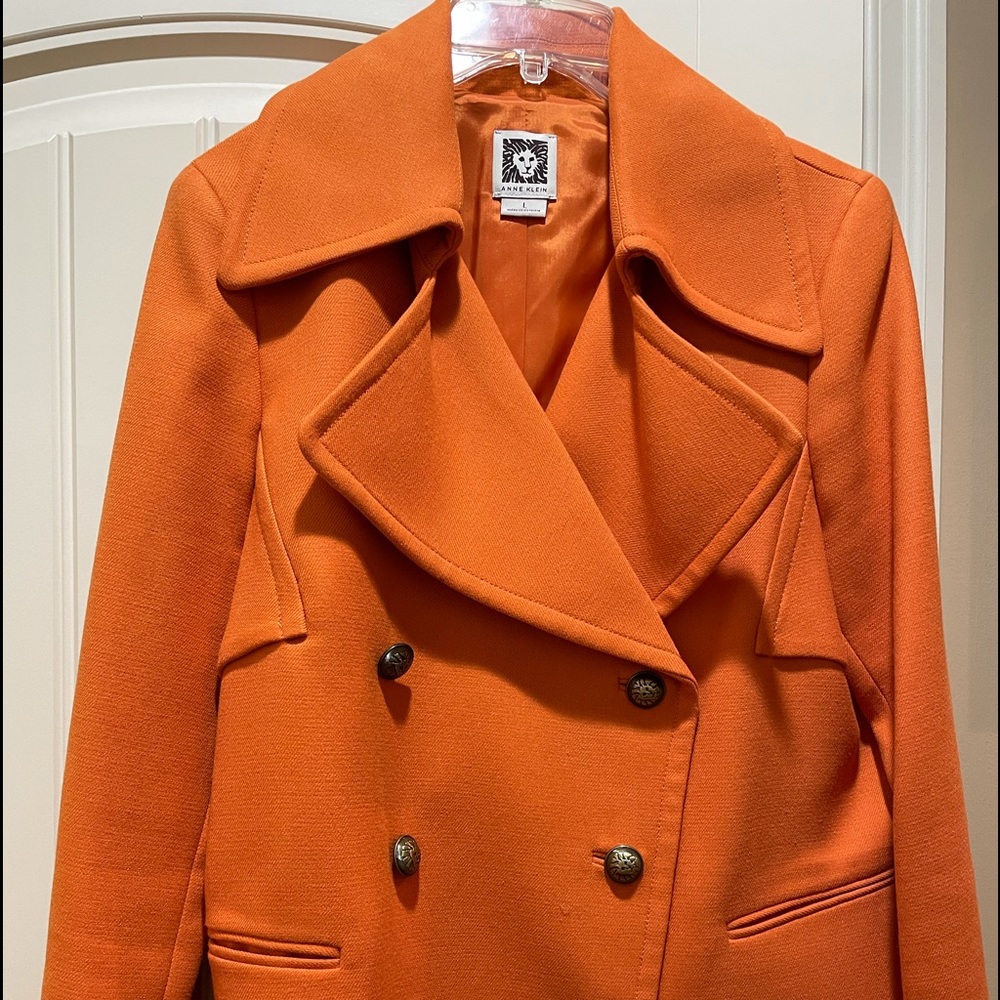 Orange Ann Klein jacket.